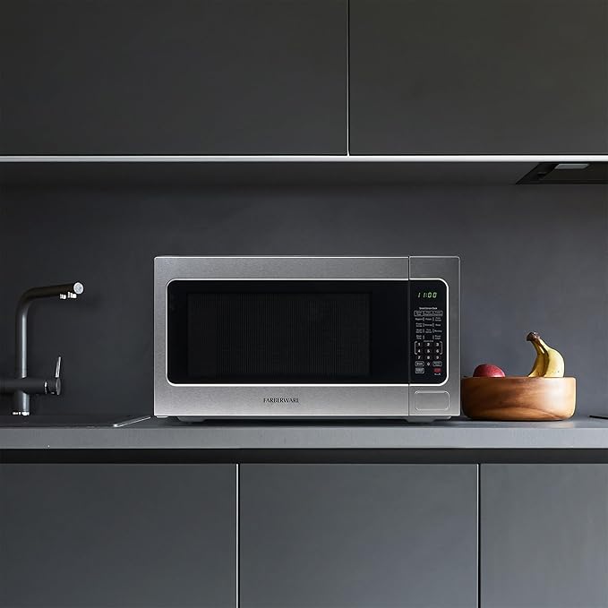 Farberware 1100W 2.2 cu ft Countertop Microwave Oven With Smart Sensor, LED Lighting, Child Lock - For Apartments and Dorms